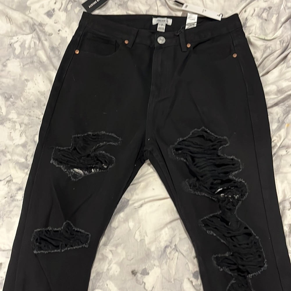 Black distressed mon jeans size 7